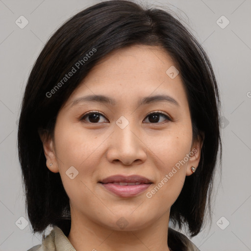 Joyful asian young-adult female with medium  brown hair and brown eyes