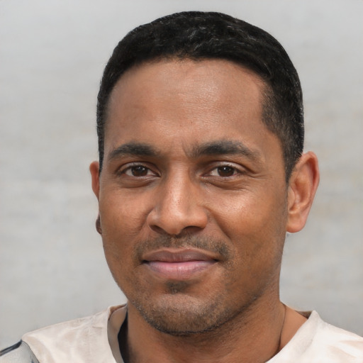 Neutral black young-adult male with short  black hair and brown eyes