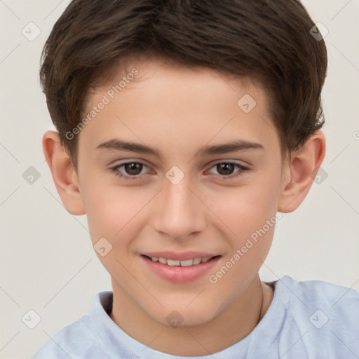 Joyful white child male with short  brown hair and brown eyes