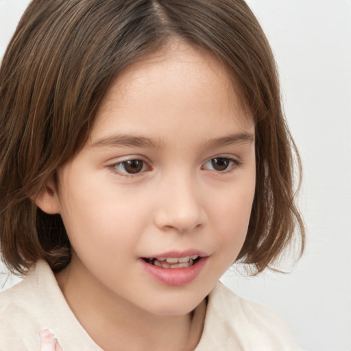 Joyful white child female with medium  brown hair and brown eyes