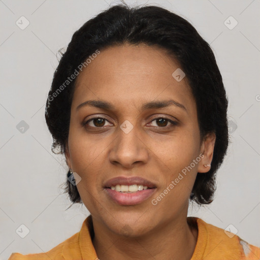 Joyful latino young-adult female with medium  brown hair and brown eyes