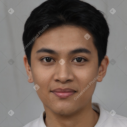 Joyful latino young-adult male with short  black hair and brown eyes
