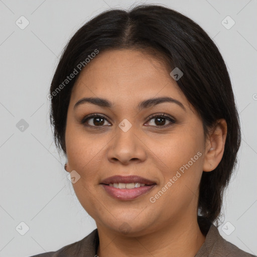 Joyful latino young-adult female with medium  brown hair and brown eyes