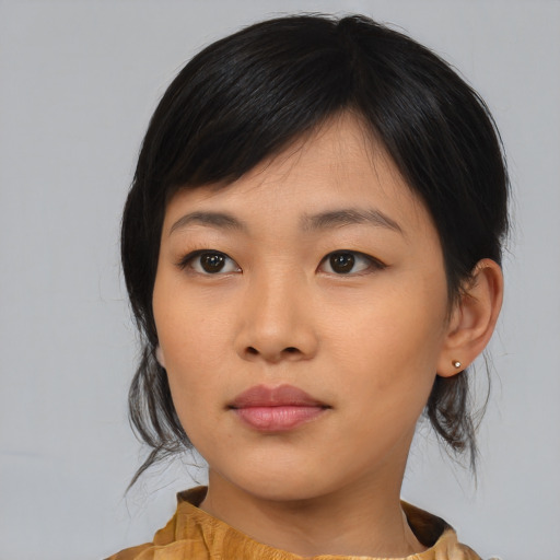Neutral asian young-adult female with medium  black hair and brown eyes