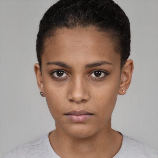 Neutral latino young-adult female with short  brown hair and brown eyes