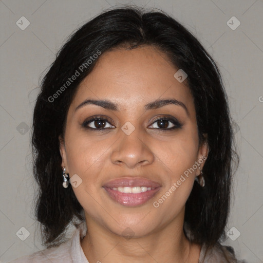 Joyful black young-adult female with long  brown hair and brown eyes