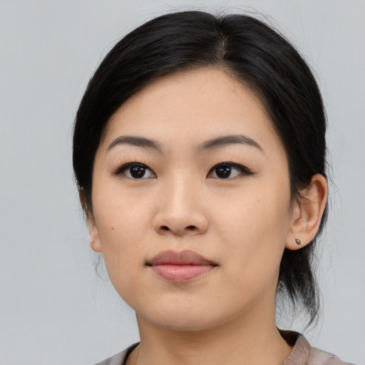 Neutral asian young-adult female with medium  black hair and brown eyes
