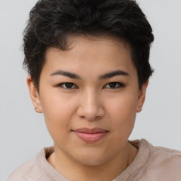 Joyful asian young-adult female with short  brown hair and brown eyes