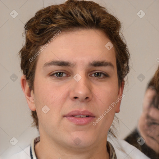 Joyful white young-adult male with medium  brown hair and brown eyes