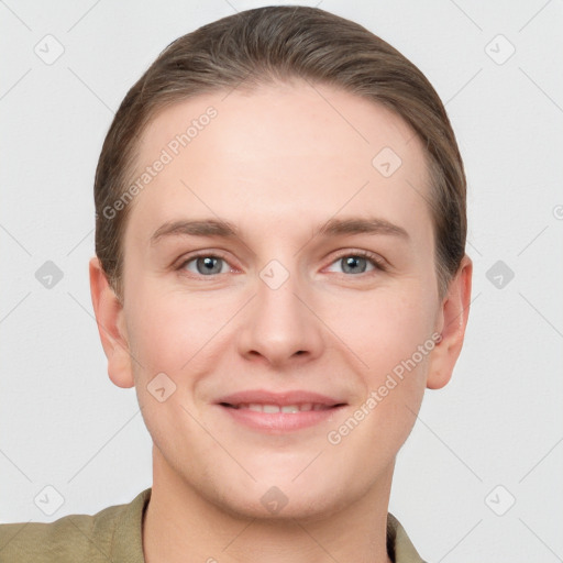 Joyful white young-adult female with short  brown hair and grey eyes