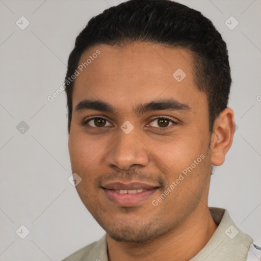 Joyful latino young-adult male with short  black hair and brown eyes