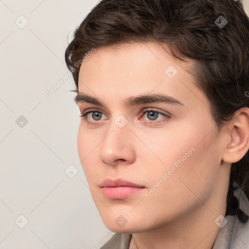 Neutral white young-adult male with medium  brown hair and brown eyes