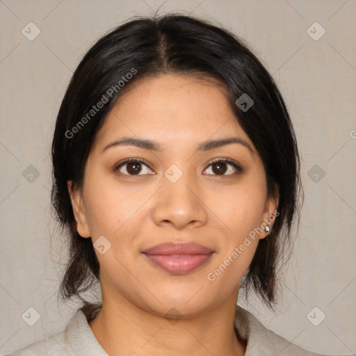 Joyful latino young-adult female with medium  brown hair and brown eyes