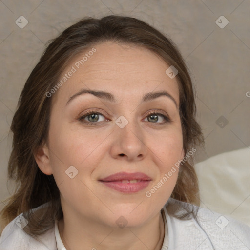 Joyful white adult female with medium  brown hair and brown eyes