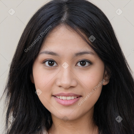 Joyful asian young-adult female with long  brown hair and brown eyes