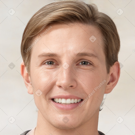 Joyful white young-adult female with short  brown hair and grey eyes