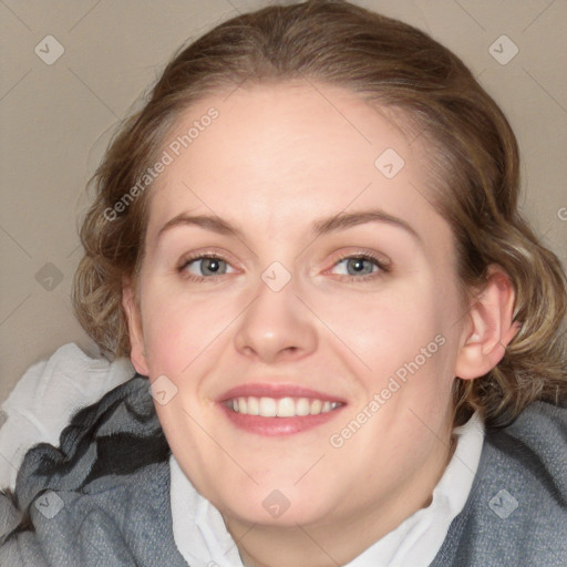 Joyful white young-adult female with medium  brown hair and blue eyes