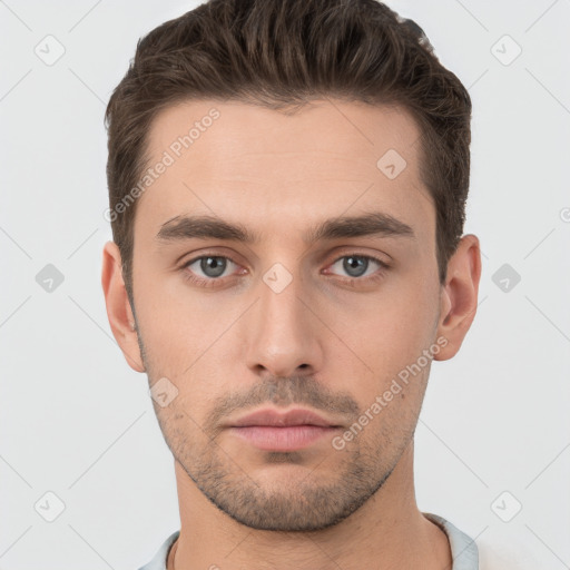 Neutral white young-adult male with short  brown hair and brown eyes