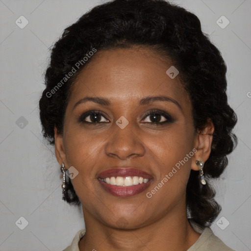 Joyful black young-adult female with medium  brown hair and brown eyes