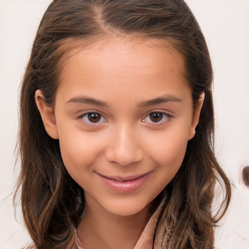 Joyful white child female with long  brown hair and brown eyes