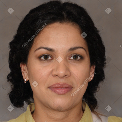 Joyful latino adult female with medium  brown hair and brown eyes