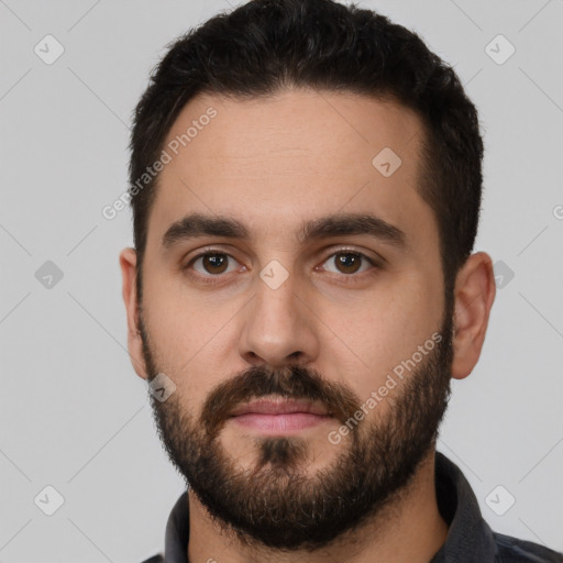 Neutral white young-adult male with short  brown hair and brown eyes