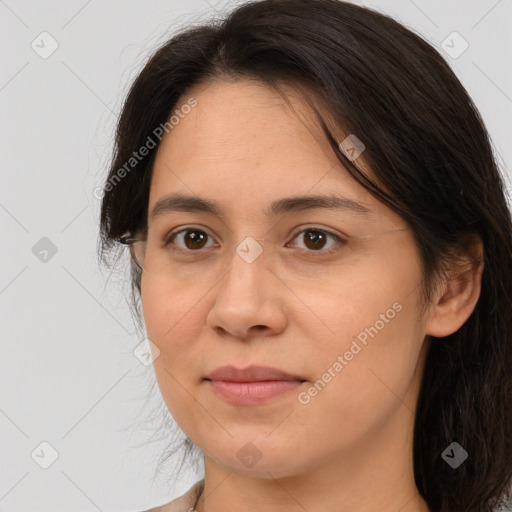 Joyful white adult female with medium  brown hair and brown eyes