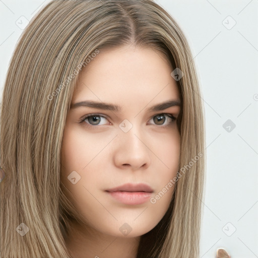 Neutral white young-adult female with long  brown hair and brown eyes