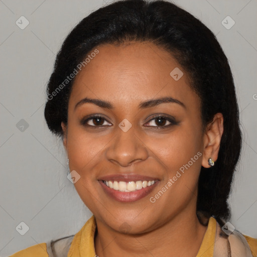 Joyful black young-adult female with medium  brown hair and brown eyes