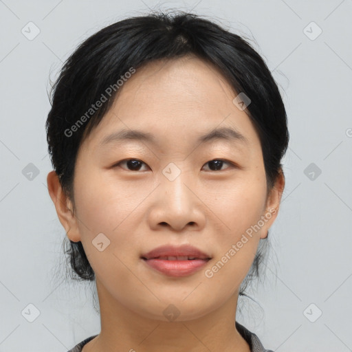 Joyful asian young-adult female with medium  black hair and brown eyes