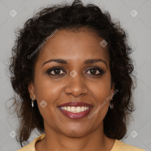 Joyful black young-adult female with medium  brown hair and brown eyes