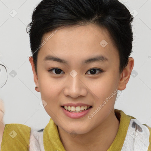 Joyful asian young-adult female with short  brown hair and brown eyes
