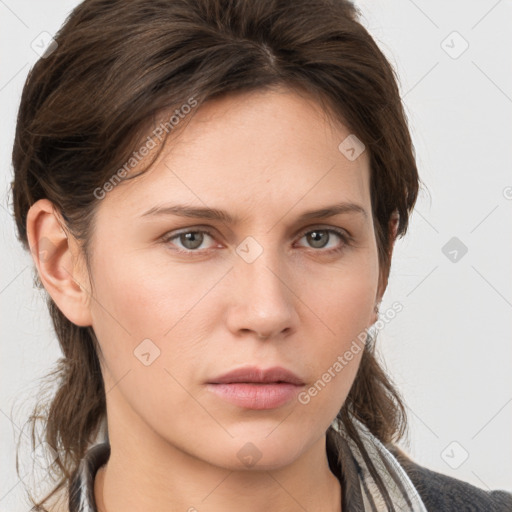 Neutral white young-adult female with medium  brown hair and grey eyes