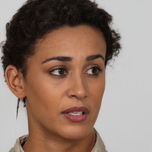 Neutral latino young-adult female with short  brown hair and brown eyes
