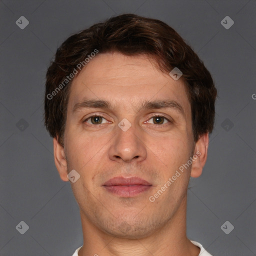 Joyful white adult male with short  brown hair and brown eyes