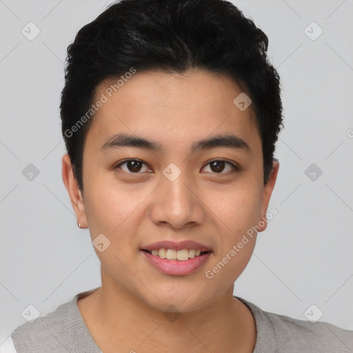 Joyful asian young-adult male with short  black hair and brown eyes