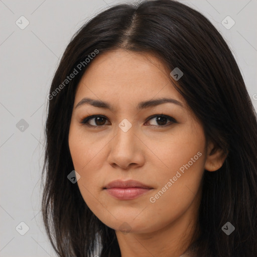 Joyful asian young-adult female with long  brown hair and brown eyes