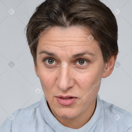 Joyful white adult female with short  brown hair and brown eyes