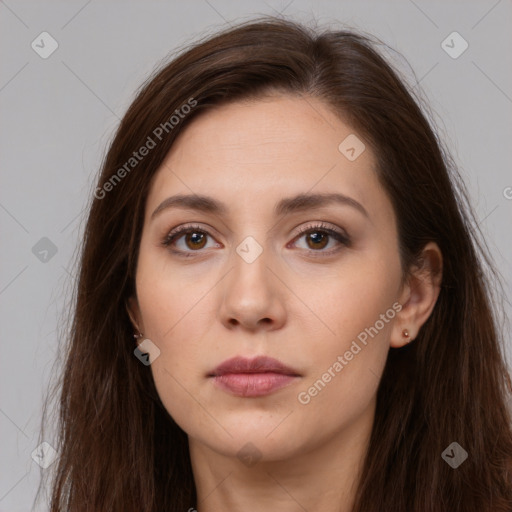 Neutral white young-adult female with long  brown hair and brown eyes