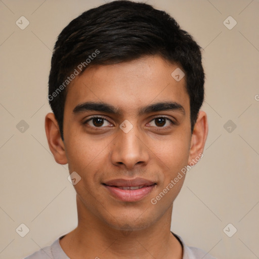 Joyful latino young-adult male with short  brown hair and brown eyes