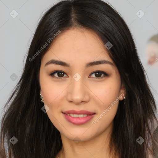 Joyful asian young-adult female with long  brown hair and brown eyes