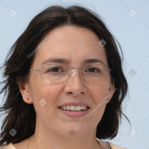 Joyful white adult female with medium  brown hair and brown eyes