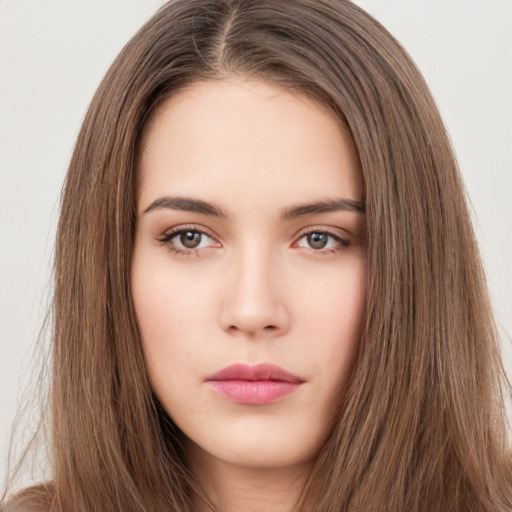 Neutral white young-adult female with long  brown hair and brown eyes