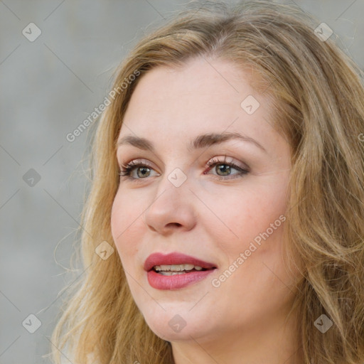 Joyful white young-adult female with long  brown hair and green eyes