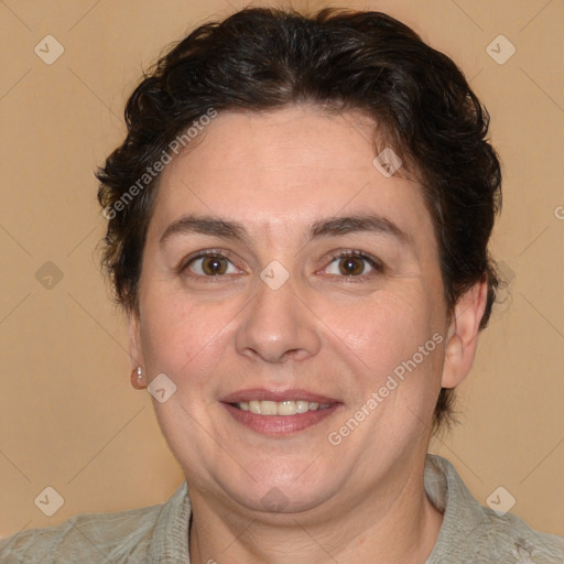 Joyful white adult female with short  brown hair and brown eyes