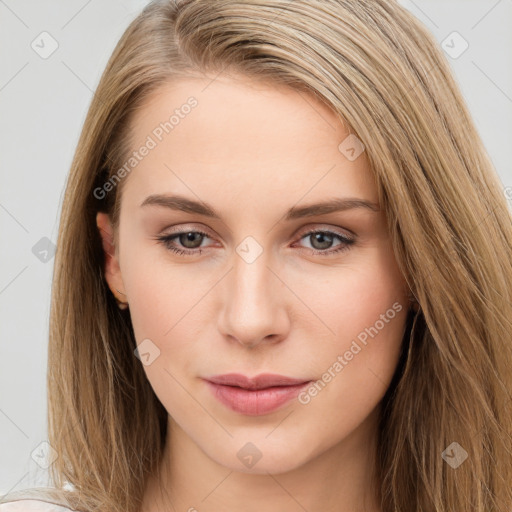 Neutral white young-adult female with long  brown hair and brown eyes