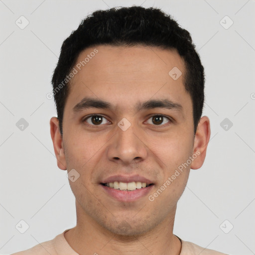 Joyful white young-adult male with short  black hair and brown eyes