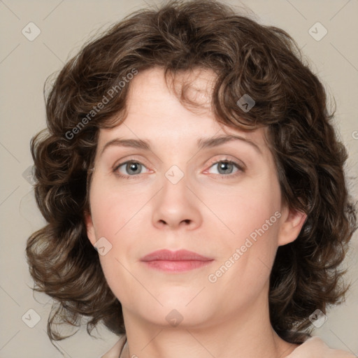 Joyful white young-adult female with medium  brown hair and green eyes