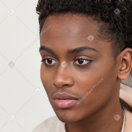 Neutral black young-adult female with short  brown hair and brown eyes