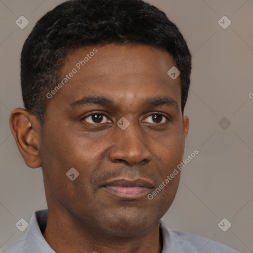 Neutral black young-adult male with short  brown hair and brown eyes